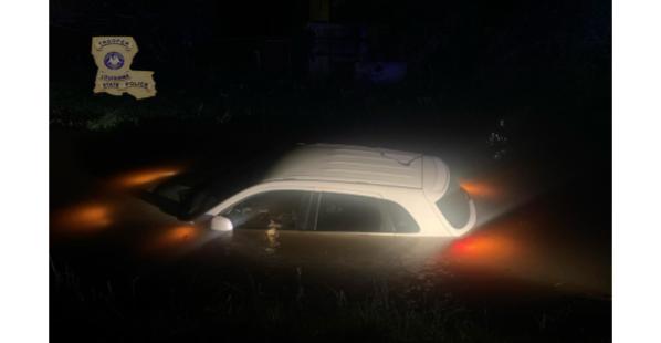 Louisiana State Troopers Rescue Woman from Rising Water
