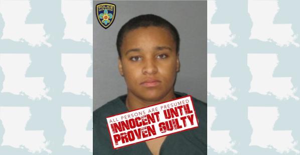 Eriel Tyson, 18, of Louisiana A black female with short brown hair. She is wearing a dark colored correctional center shirt.